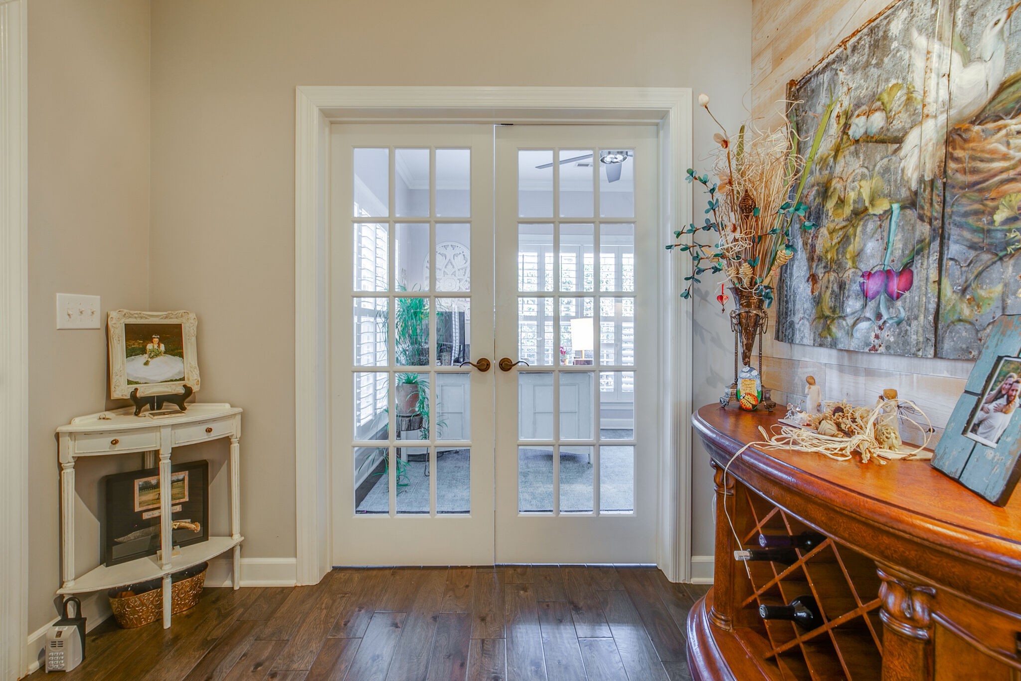 136 Ormesby Place Franklin, TN 37064 - Photo 27 of 41 a view of a workspace with wooden floor and a fireplace