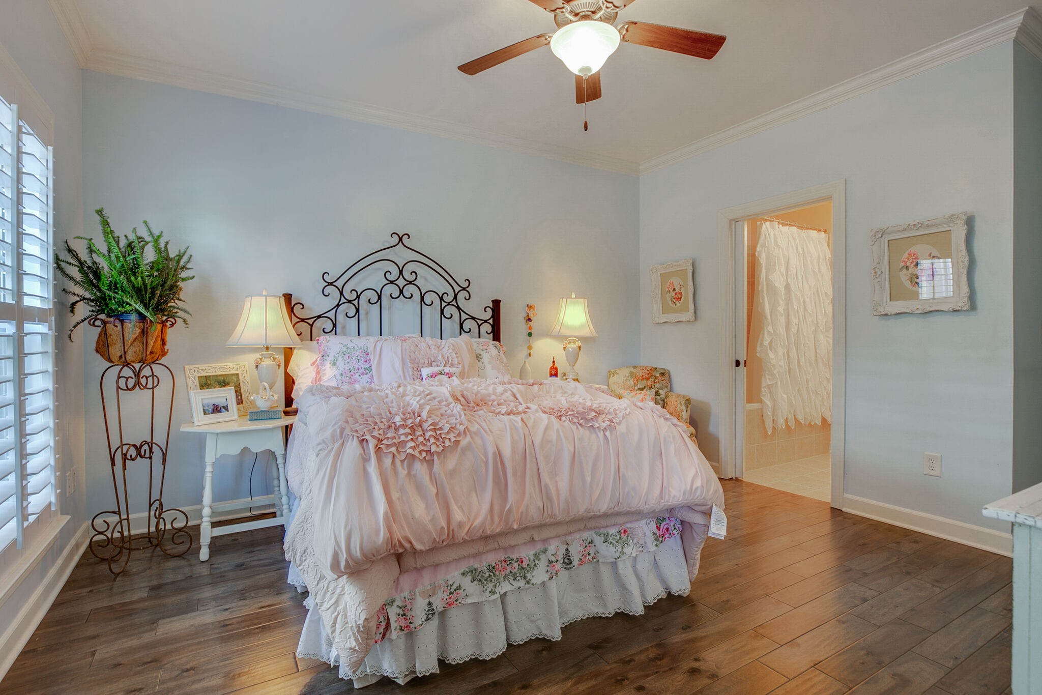 136 Ormesby Place Franklin, TN 37064 - Photo 31 of 41 a bedroom with a bed and a chandelier