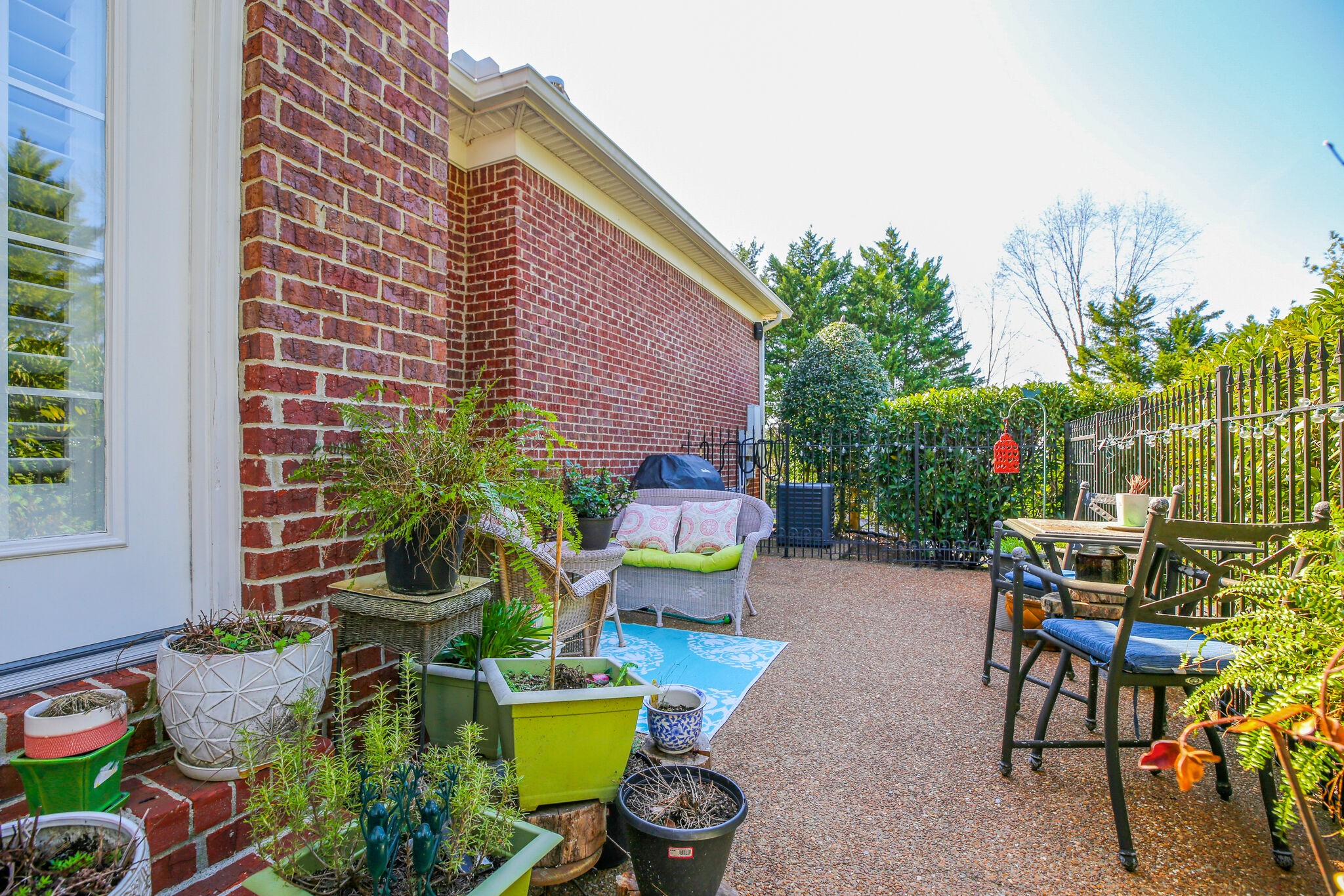 136 Ormesby Place Franklin, TN 37064 - Photo 40 of 41 a view of a chairs and table in a backyard