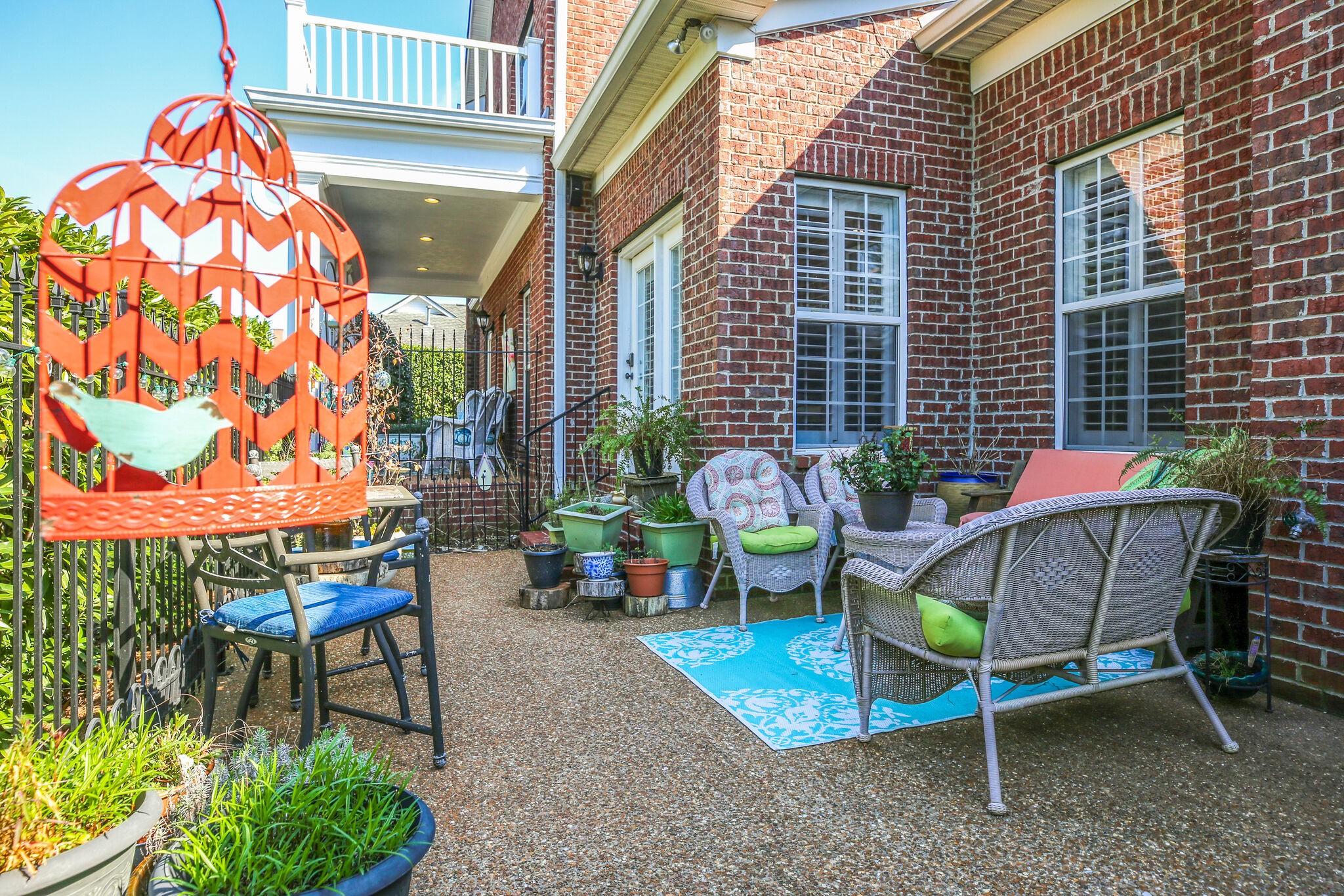 136 Ormesby Place Franklin, TN 37064 - Photo 41 of 41 a backyard of a house with table and chairs