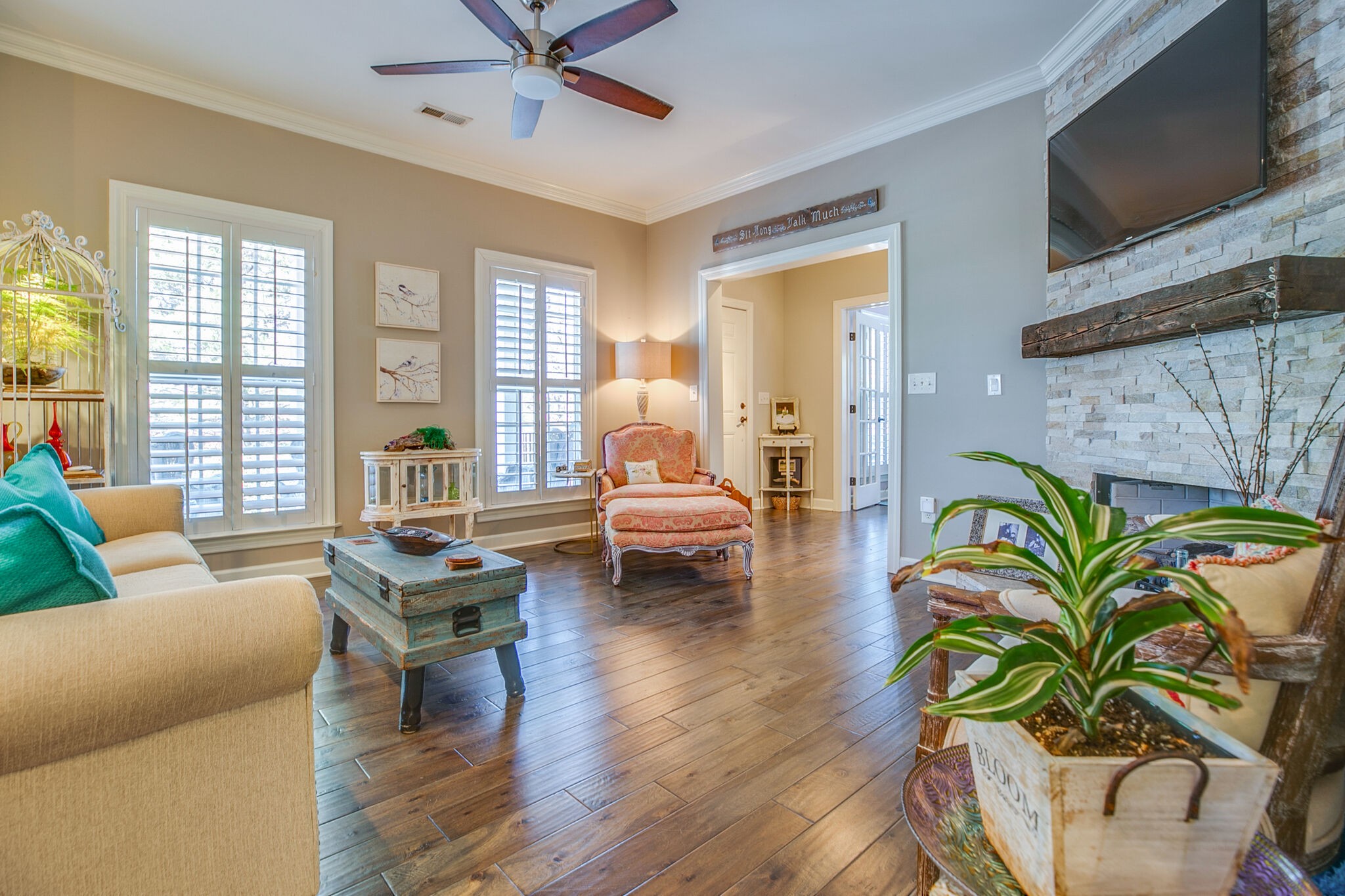 136 Ormesby Place Franklin, TN 37064 - Photo 10 of 41 a living room with patio furniture and a floor to ceiling window