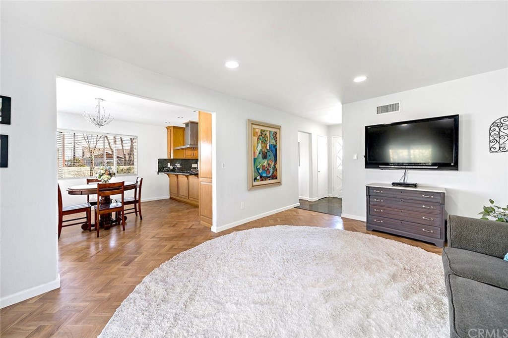 525 East 246th Street Carson, CA 90745 - Photo 15 of 41 a view of a livingroom with furniture and a flat screen tv