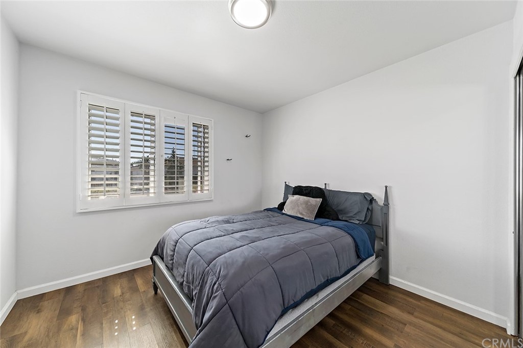 525 East 246th Street Carson, CA 90745 - Photo 20 of 41 a bedroom with a bed and window