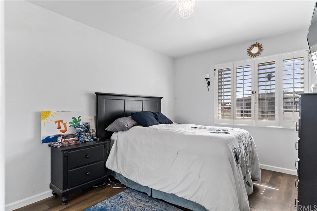525 East 246th Street Carson, CA 90745 - Photo 24 of 41 a bedroom with a bed and a window