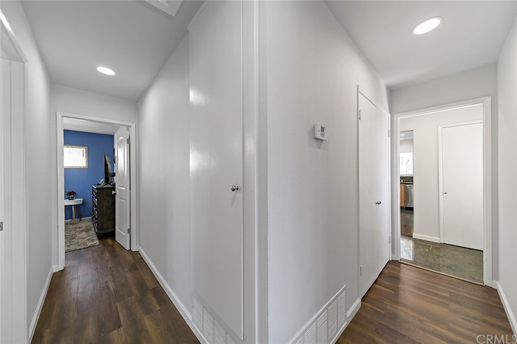525 East 246th Street Carson, CA 90745 - Photo 26 of 41 a view of a hallway with a wooden floor