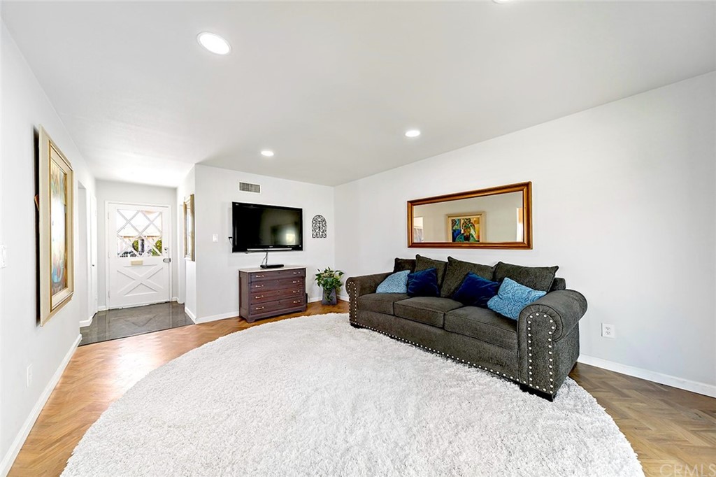 525 East 246th Street Carson, CA 90745 - Photo 3 of 41 a living room with furniture and a flat screen tv