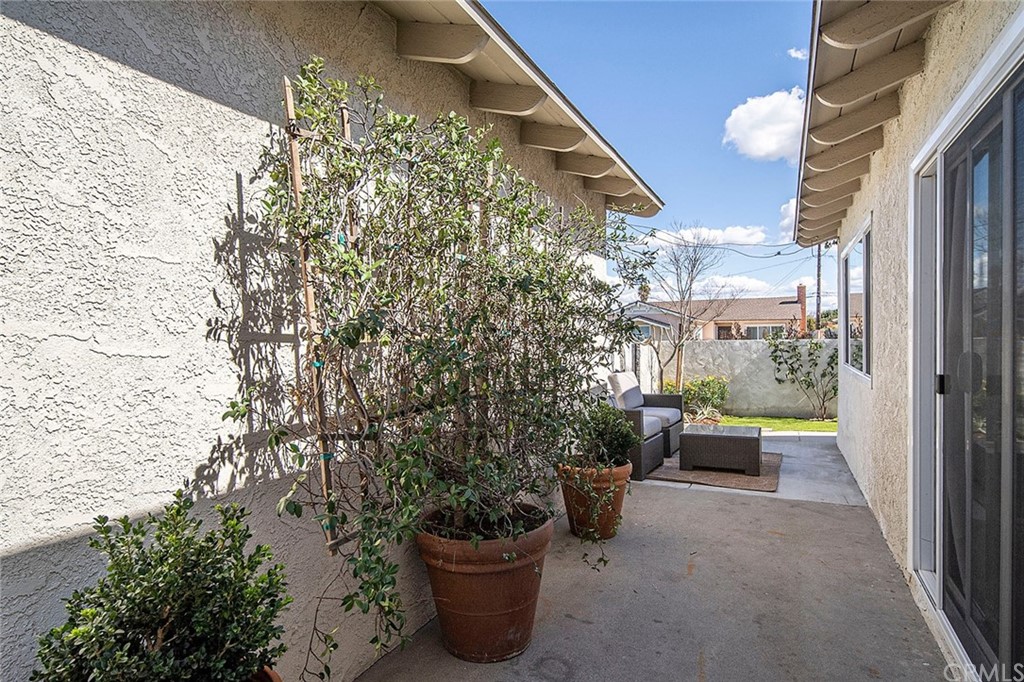 525 East 246th Street Carson, CA 90745 - Photo 31 of 41 a view of a balcony with chairs potted plants