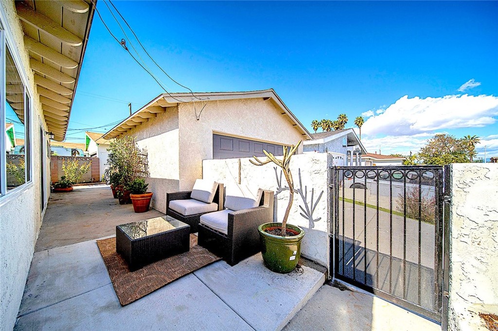525 East 246th Street Carson, CA 90745 - Photo 32 of 41 a view of a patio with couches and potted plants