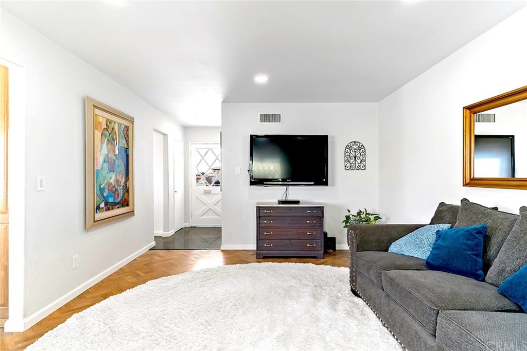 525 East 246th Street Carson, CA 90745 - Photo 4 of 41 a living room with furniture and a flat screen tv
