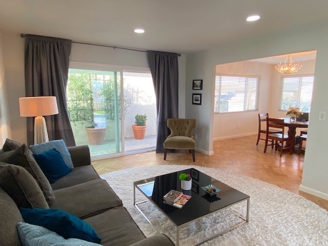 525 East 246th Street Carson, CA 90745 - Photo 6 of 41 a living room with furniture and a large window