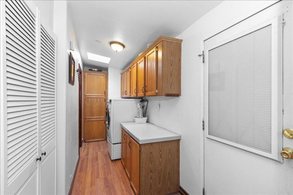 2285 Tierra Heights Road Boulevard, CA 91905 - Photo 22 of 51 a bathroom with a sink a mirror and shower