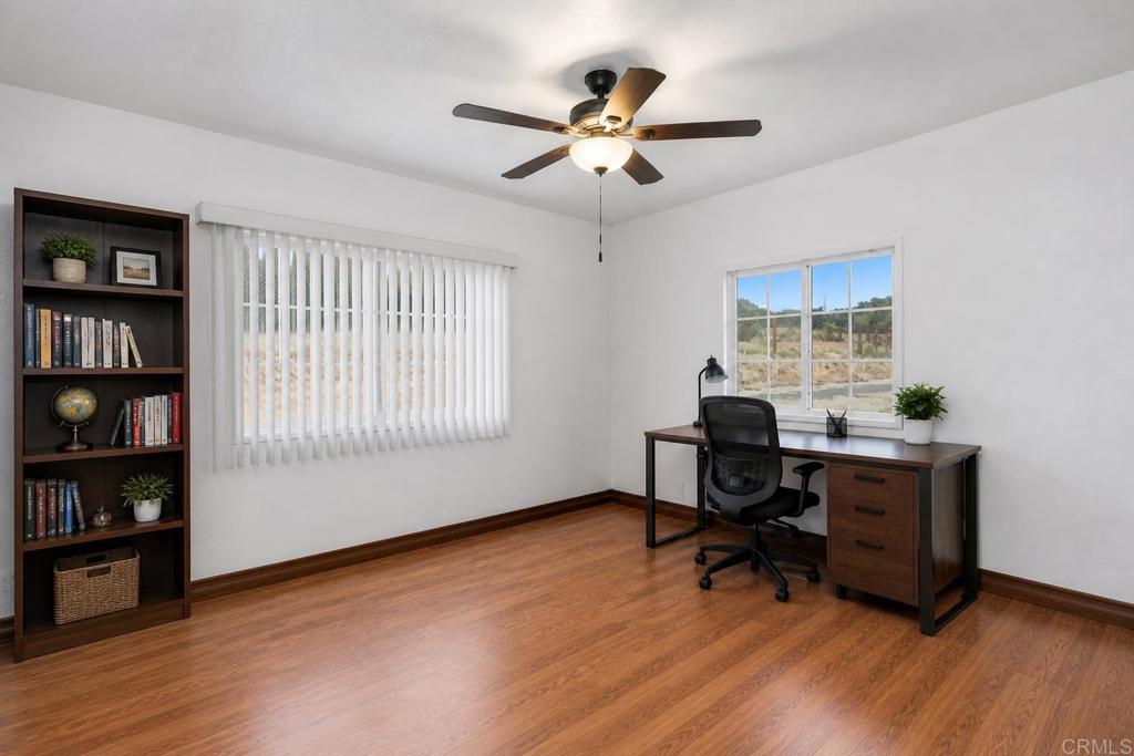 2285 Tierra Heights Road Boulevard, CA 91905 - Photo 23 of 51 a workspace with wooden floor and a window