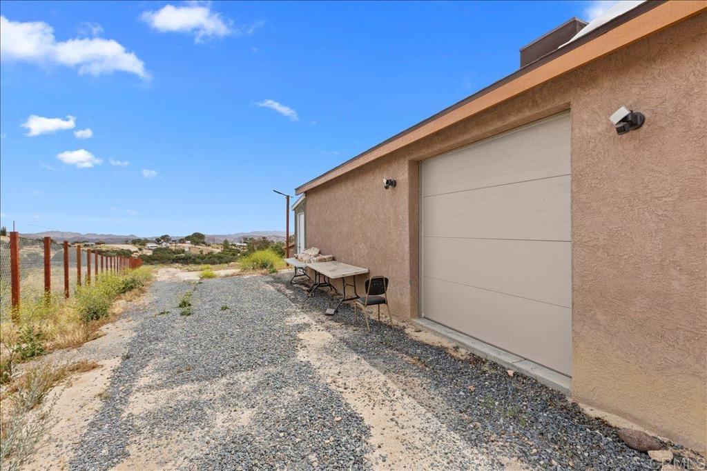 2285 Tierra Heights Road Boulevard, CA 91905 - Photo 37 of 51 a view of a backyard of the ocean and trees
