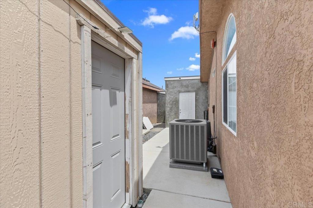 2285 Tierra Heights Road Boulevard, CA 91905 - Photo 38 of 51 a view of a house with a door and wooden floor