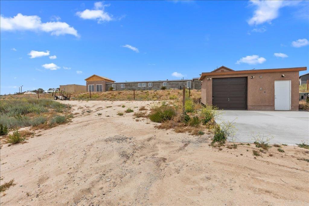 2285 Tierra Heights Road Boulevard, CA 91905 - Photo 43 of 51 a view of dirt road with a building in the background