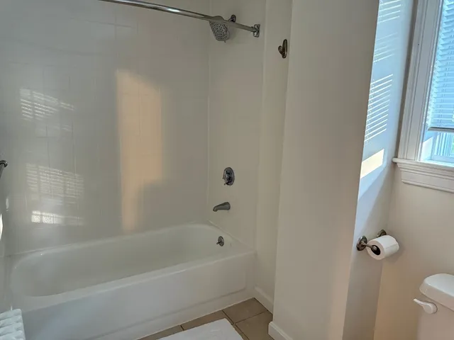 a bathroom with a bathtub