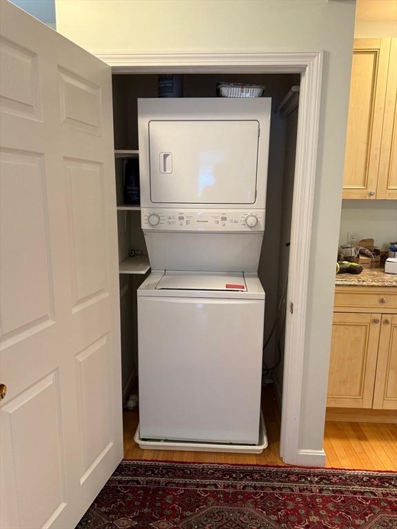 21 Denmark Avenue, Unit 2 Milton, MA 02186 - Photo 6 of 18 a utility room with dryer and washer
