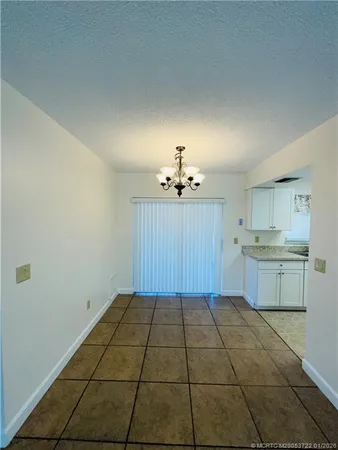 a view of a kitchen with a sink