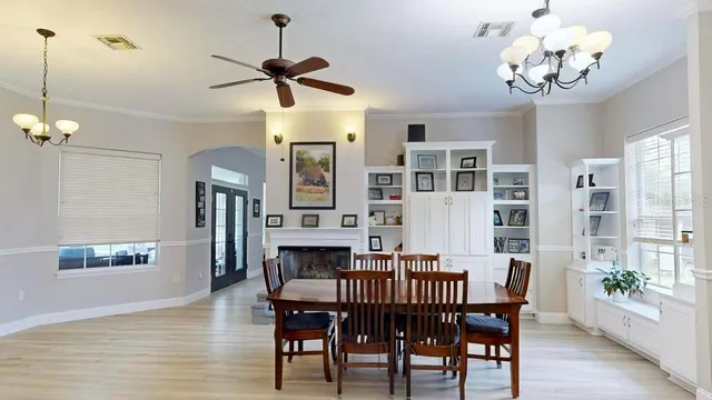 a bathroom with a double vanity sink mirror and toilet
