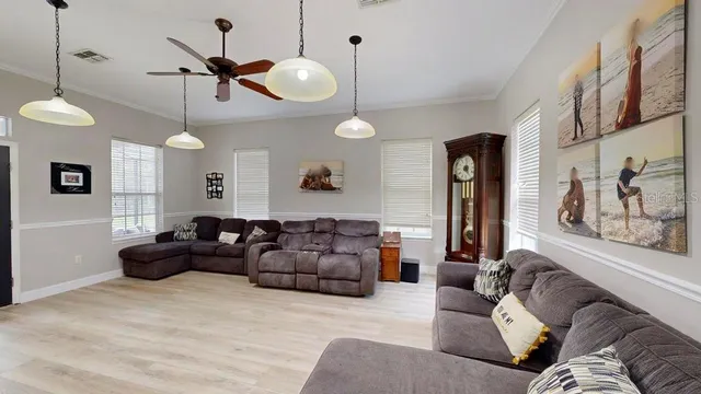 a bathroom with a sink vanity mirror and toilet