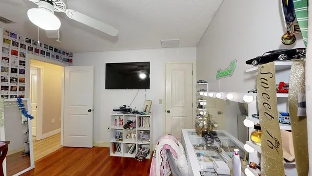 a bathroom with a shower and a window