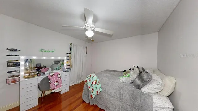 a en suite bathroom with a sink and a mirror