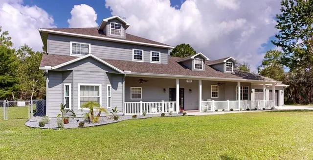a view of a hallway to filled with wooden furniture and windows