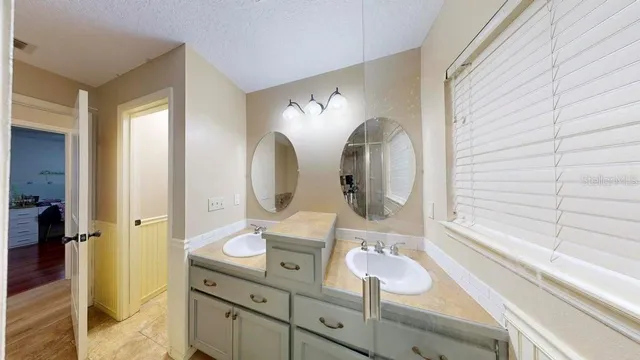 a view of a livingroom with furniture and wooden floor