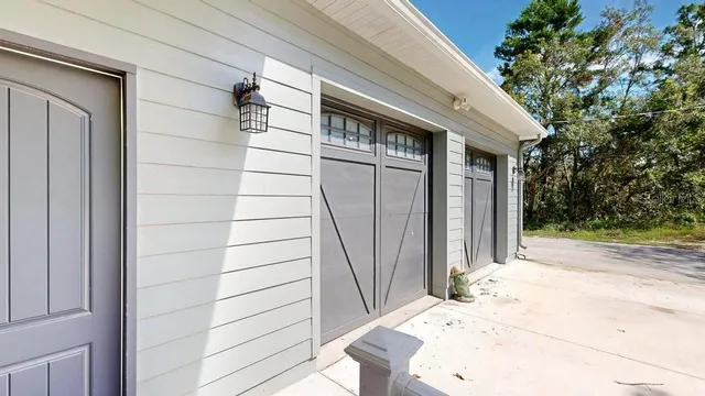 a view of an entryway with wooden floor and stairs