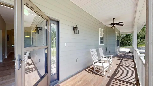 a kitchen with granite countertop a stove sink and cabinets