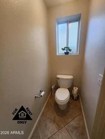 a bathroom with a toilet