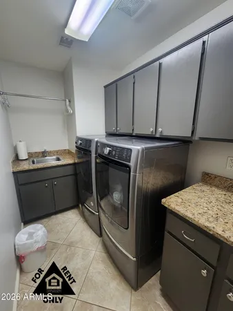 a kitchen with a stove and a microwave