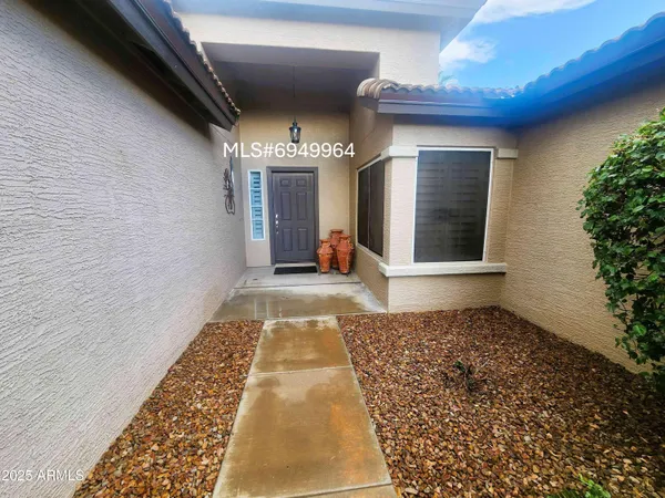a front view of a house with entryway