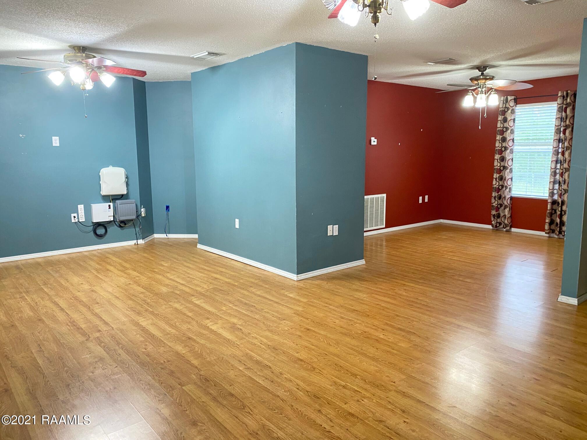 426 Hebert Road Scott, LA 70583 - Photo 7 of 21 Living Room to Dining Area