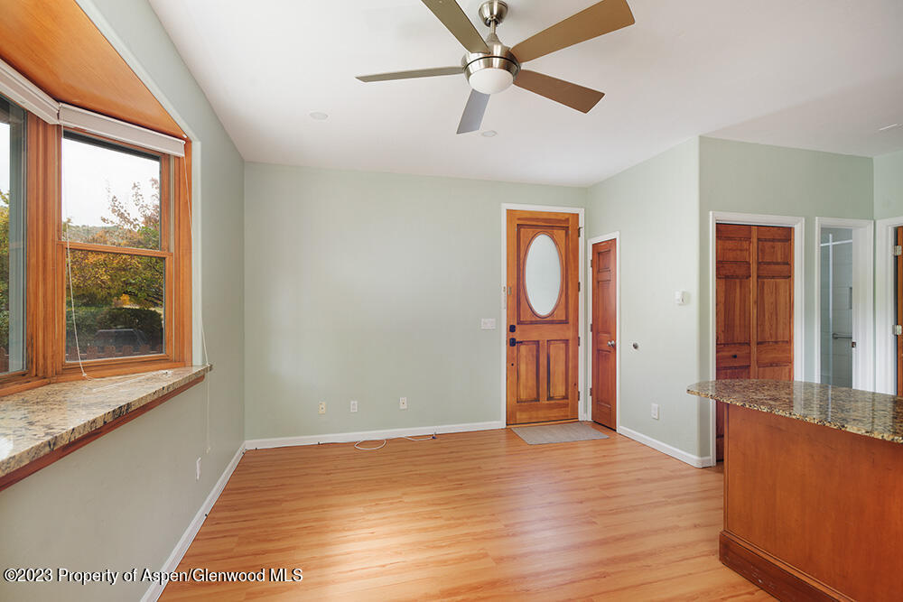 330 Alexander Lane Basalt, CO 81621 - Photo 3 of 10 wooden floor in an empty room with a window