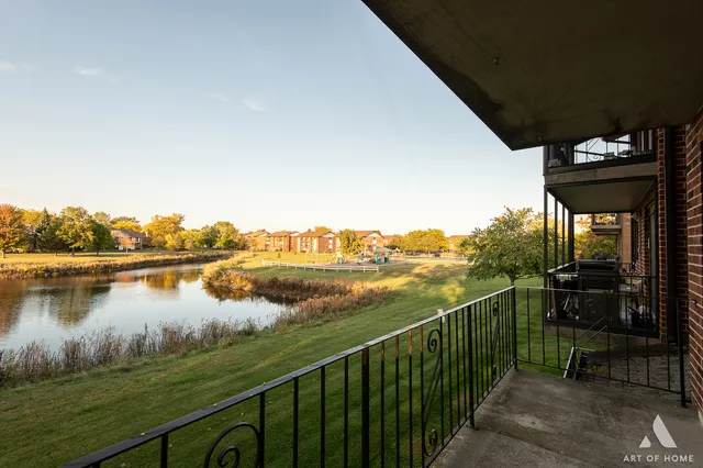 a view of a balcony with lake view