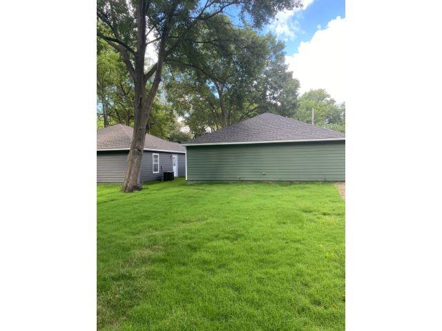 3554 Kruger Road Memphis, TN 38108 - Photo 4 of 10 a view of a house with a backyard