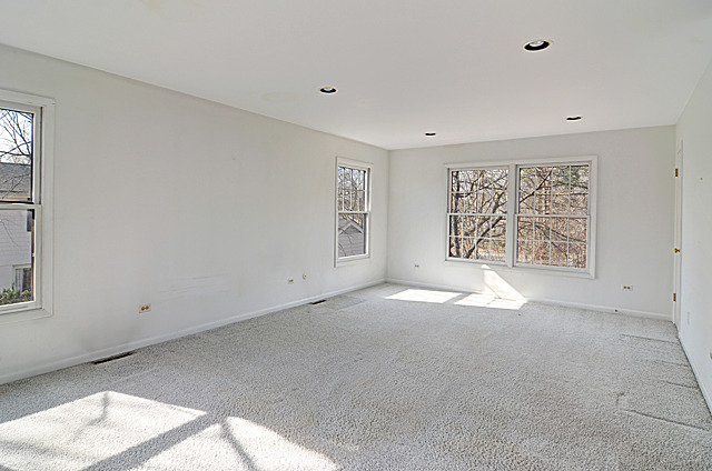 851 South County Line Road Hinsdale, IL 60521 - Photo 12 of 25 a view of an empty room with a window and bathroom