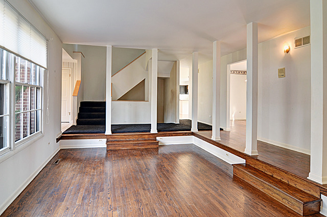 851 South County Line Road Hinsdale, IL 60521 - Photo 3 of 25 a view of an entryway with wooden floor and door