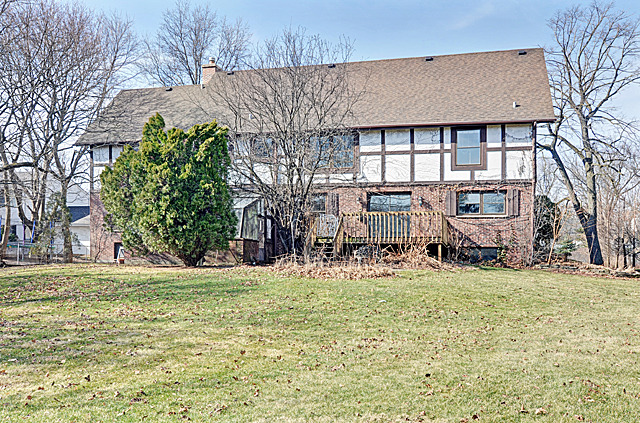 851 South County Line Road Hinsdale, IL 60521 - Photo 24 of 25 a view of a house with a yard and sitting area