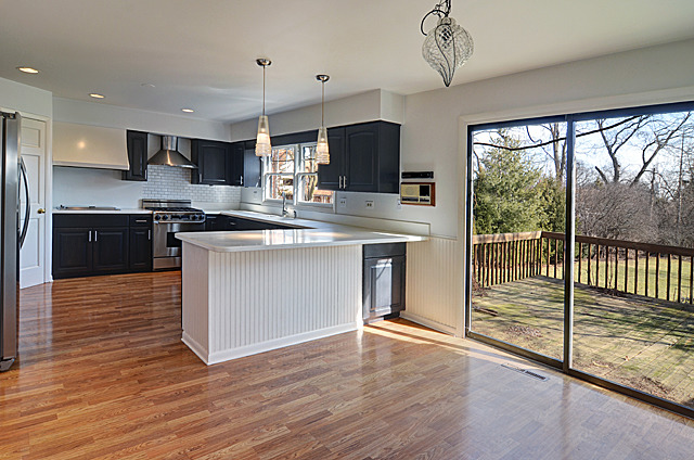 851 South County Line Road Hinsdale, IL 60521 - Photo 7 of 25 a kitchen with stainless steel appliances granite countertop a stove a sink and a refrigerator