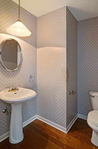 851 South County Line Road Hinsdale, IL 60521 - Photo 9 of 25 a bathroom with a sink mirror and toilet