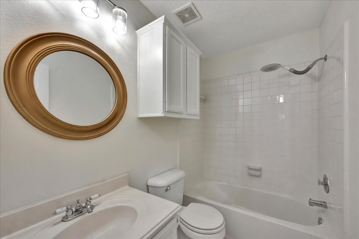 14010 Hazel Ridge Court Houston, TX 77062 - Photo 28 of 38 Full hall bathroom upstairs located between the bedrooms.