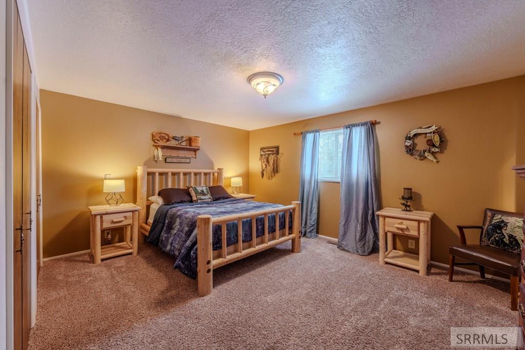 4214 Shoshone Road Island Park, ID 83429 - Photo 20 of 42 Master Bedroom w/ bath