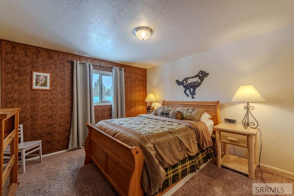 4214 Shoshone Road Island Park, ID 83429 - Photo 23 of 42 Guest Bedroom