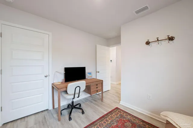 a workspace with a desk and chair
