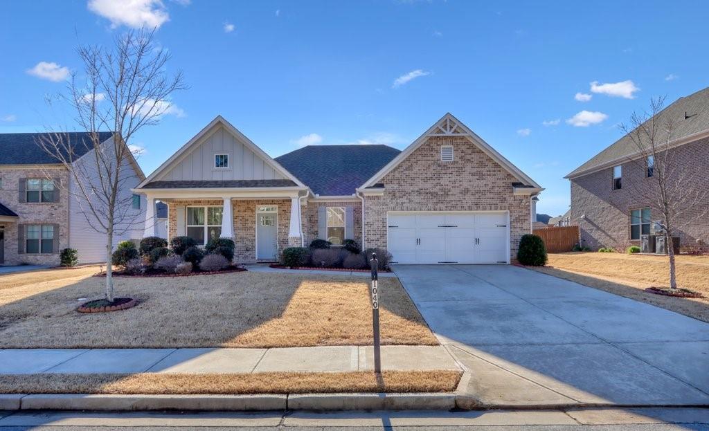 1040 Bar Harbor Place Lawrenceville, GA 30044 - Photo 1 of 1 a view of a house with entertaining space