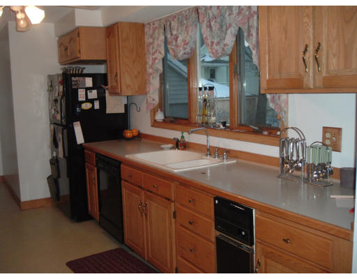 75 Redlands Street Springfield, MA 01104 - Photo 4 of 10 a bathroom with a sink and a mirror