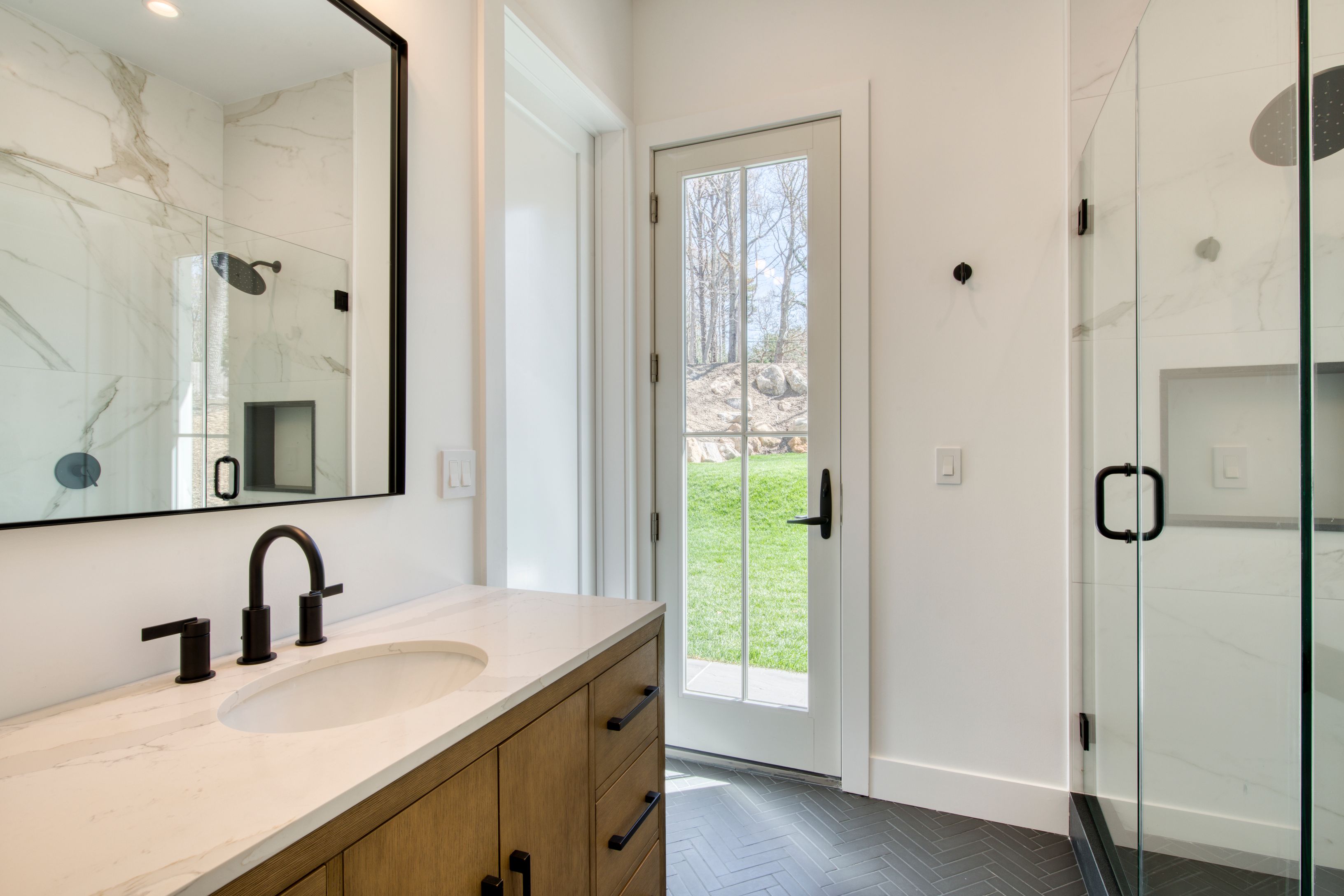 18 Barnes Avenue East Hampton, NY 11937 - Photo 11 of 35 a bathroom with a sink and a mirror