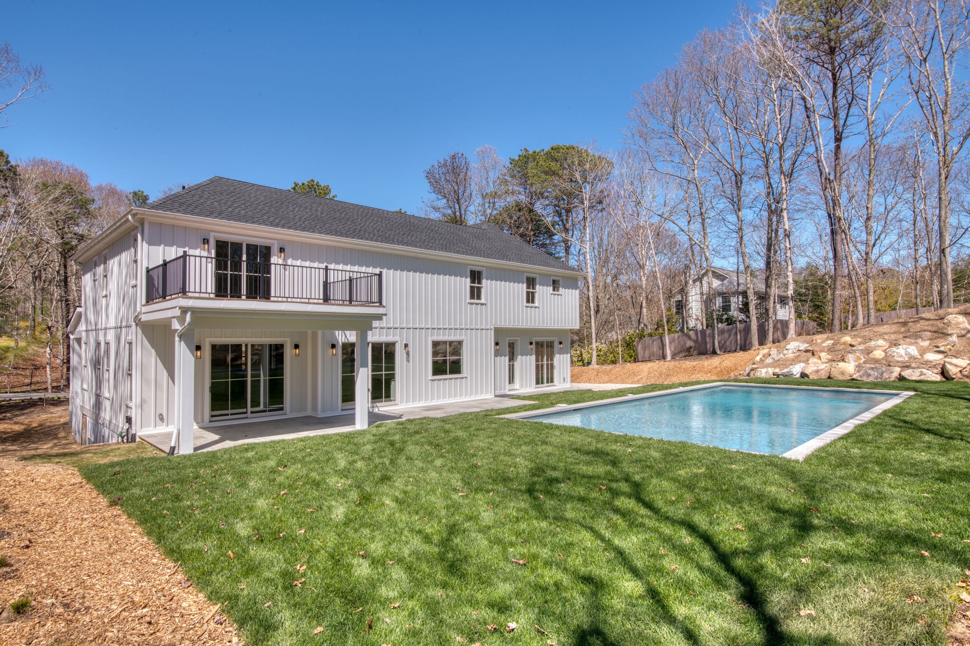 18 Barnes Avenue East Hampton, NY 11937 - Photo 25 of 35 a view of a house with a swimming pool